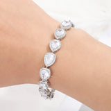 ZAKOL Classic Water Drop CZ Bracelet – Elegant Sparkle for Brides and Special Occasions.